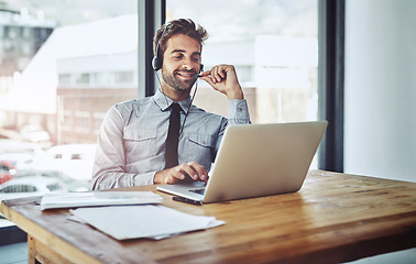 Image showing Happy businessman, laptop and call center for consulting in customer service or financial advice at office. Friendly man person, consultant or agent talking on computer in online support at workplace