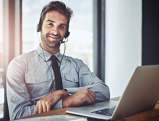 Image showing Businessman, laptop and portrait smile in call center, customer support or financial advice at office. Friendly man person or consultant agent with headphones for online consulting help at workplace