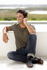 Image showing Happy, phone call and man outdoor, relax or summer holiday with confidence, connection or communication. Male person, stylish or guy with a smartphone, Spain and conversation with happiness outside