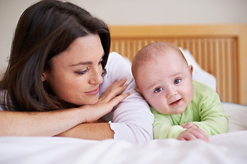 Image showing Mother, happy baby and relax bed for love, care and fun quality time together at home. Mom, cute newborn child and bonding in bedroom for support, happiness and joy for healthy development of infant