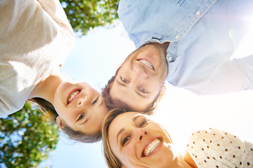 Image showing Happy portrait, outdoor circle and family child, mother and father support, bonding and enjoy outdoor quality time together. Love, sky and below view of mama, papa and kid smile for nature sunshine