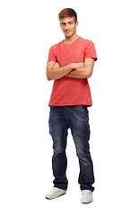 Image showing Fashion, happy and portrait of man in studio with confidence, attractive and crossed arms. Pride, confident and face of isolated handsome young male person with trendy clothes on white background