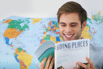 Image showing Travel agent, office and happy man reading brochure information, tourism book or planning global trip. Business magazine, professional agency employee and male person review holiday destination route