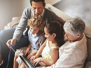 Image showing Grandparents, laptop or fun kids learning how to type or playing online game in family home together. Education, child development or children siblings on computer with grandmother or grandfather