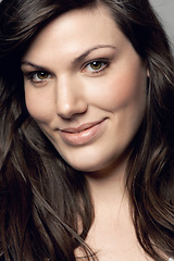 Image showing Woman, natural beauty and portrait with skincare and dermatology from Spain. Isolated, face closeup and young female person in studio with smile from skin glow treatment with cosmetics and makeup