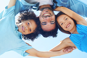 Image showing Portrait, blue sky and happy family hug, father and children bonding, support and solidarity circle for care, unity or love. Group face, freedom and below view of kids, parent or people together