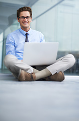 Image showing Laptop, office floor and portrait of happy man, agent or professional consultant typing report, project or email. Research, company workplace and male businessman, banker or person sitting on ground