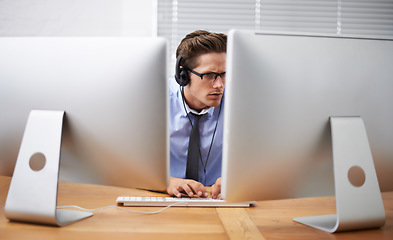 Image showing Computer, office focus and business man typing, reading or working project, research report or statistics analysis. Information technology, cybersecurity and person listening to music while coding