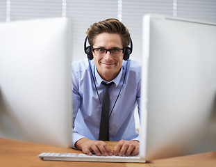 Image showing Computer, office portrait and happy man, business agent or consultant working project, software system or tech report. Programmer, cybersecurity developer and person listening to music while coding