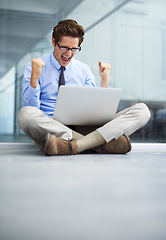 Image showing Laptop, office celebration and happy man excited for winning, notification or company investment success. Winner, achievement and male person screaming, wow and celebrate online news announcement