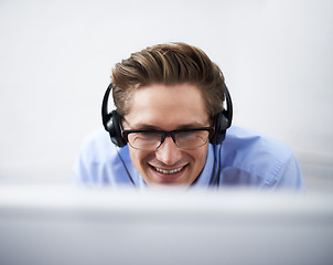 Image showing Office computer, face and happy man reading, smile and happiness for script success, software code or IT work. Information technology, cybersecurity developer or closeup person listening to music
