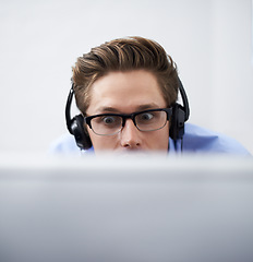 Image showing Office computer, face and man reading script, software code or problem solving cyber security system. Information technology, cybersecurity developer or closeup person listening to music while coding