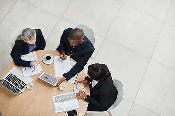 Image showing Top view, staff and employees brainstorming, collaboration and planning with technology, documents and discussion. Business people, group and coworkers share ideas, website launch and online reading