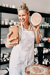 Image showing Happy woman, pottery and smile in small business selfie for social media, advertising or vlog at store. Female person or retail owner smiling with clay bowl for photo or online post on smartphone