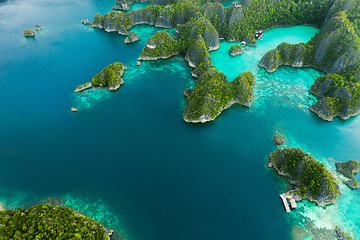 Image showing Nature, drone view and ocean with greenery on a tropical island at a summer vacation resort. Environment, lake water and aerial view of outdoor sea with forestry mountains and plants in environment.