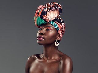 Image showing Beauty, African fashion and face of black woman in studio with glamour, cosmetics and makeup. Thinking, luxury and female person in exotic jewellery, African style and head scarf on gray background