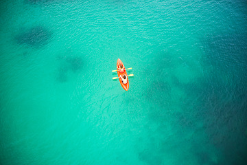 Image showing Top view, boat and people in blue ocean together for kayak adventure, travel or journey at sea on mockup. Couple trailing or rowing on big calm, peaceful or serene beach water in nature for kayaking