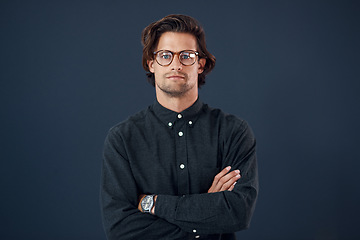 Image showing Portrait, serious and business man with arms crossed isolated on office wall background mockup space. Glasses, entrepreneur and confident face of male accountant from Australia with pride for career.