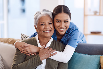 Image showing Portrait, happy and nurse hug old woman in retirement house, bonding and medical care. Face, hugging and elderly person with caregiver in nursing home on living room sofa for health, support or help.