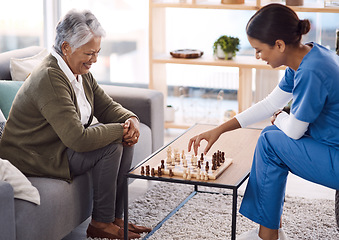 Image showing Women, chess and nurse with a senior patient, retirement home and happiness with healthcare. Female person, medical professional and mature lady with employee, nursing and care with games and relax