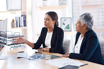 Image showing Mentor, teamwork or business women with computer talking, speaking or planning a project in office. Technology, collaboration or senior manager with female intern for strategy training or coaching