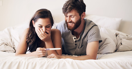 Image showing Couple, bedroom and pregnancy test, happy and excited for future family, life, love and happiness together. Positive results, man with pregnant woman on bed with good news, surprise and shock in home