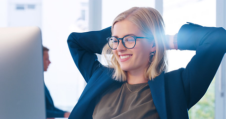 Image showing Relax, computer and a business woman done with work for the day in her office with her hands behind her head. Happy, flare and complete with a young female employee working online using a desktop