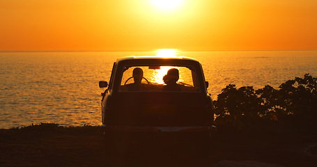 Image showing Beach, silhouette and people in car at sunset for freedom, travel or road trip together. Dark, summer and friends in transport in the evening at the ocean for a date, vacation or adventure by the sea