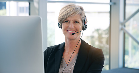 Image showing Portrait, call center and mature woman with a smile, telemarketing and customer service. Face, female person and employee with a headphones, consultant and agent with a career, crm and professional