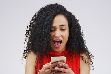 Image showing Wow, social media and a woman with a phone for a chat isolated on a white background in a studio. Surprise, fake news and young girl with a mobile for communication, conversation app and connectivity