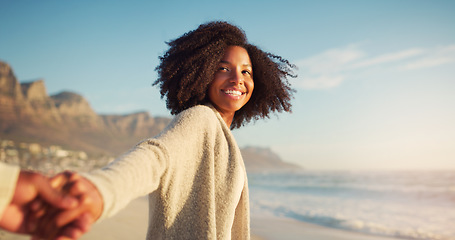 Image showing Beach, love and woman holding hands with her boyfriend while on a summer vacation or weekend trip. Travel, outdoor and happy female person walking by the ocean with affection on a tropical holiday.