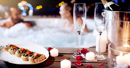 Image showing Love, luxury and champagne with hot tub at spa for holiday, romantic vacation and weekend getaway. Couple, marriage and man and woman in bath with food for honeymoon, anniversary and valentines day