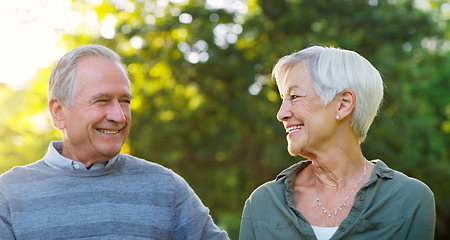 Image showing Senior couple, happy and love outdoor at a park with a smile, care and support for health and wellness. A elderly man and woman in nature for a walk, quality time and healthy marriage or retirement