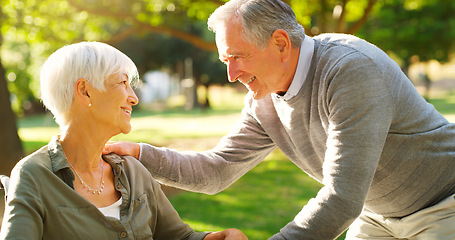 Image showing Senior couple, happy and talking outdoor at a park with love, care and support. A elderly man and woman in nature for communication, quality time and healthy marriage or retirement with understanding