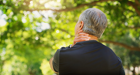 Image showing Back view of senior man, neck pain and injury outdoor, fibromyalgia health problem and joint ache from exercise. Male pensioner with arthritis, retirement with fitness in park and mockup space