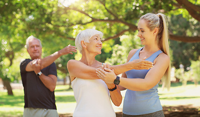 Image showing Yoga, workout and an old couple with their personal trainer in a park for a health or active lifestyle. Exercise, wellness or zen and senior people outdoor for fitness class with their pilates coach