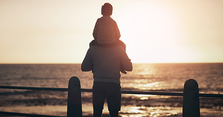 Image showing Father, child and back in sunset by the ocean for family bonding, playing or fun holiday or weekend in nature. Dad carrying kid on piggyback by beach coast enjoying sunrise or travel together outdoor