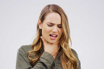 Image showing Woman, sore throat and virus from cough, allergies or bacteria against a white studio background. Sick female person touching neck in pain, allergy or flu of cold, illness or tuberculosis infection