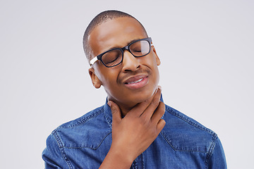 Image showing Black man, sore throat and virus from cough, allergies or bacteria against a white studio background. Sick African male person touching neck in pain, allergy or flu of cold, illness or infection