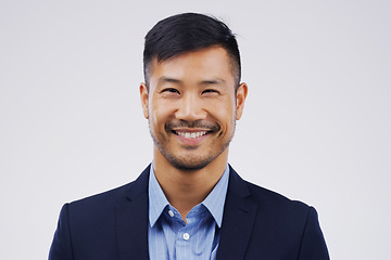 Image showing Portrait, business and Asian man with a smile, lawyer and confident guy against a grey studio background. Face, male person and employee with happiness, agent and career development with professional