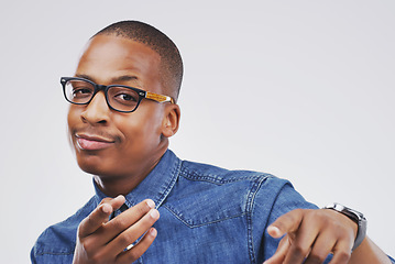 Image showing Portrait, smile and black man pointing to you, motivation and confident guy against a white studio background. Face, male person or happy model with hand gesture, decision and choice with opportunity