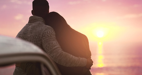 Image showing Couple, hug and sky or sunset at beach on vacation, holiday or adventure. Back of man and woman together for love, road trip and travel journey or date outdoor in nature with mockup space and freedom