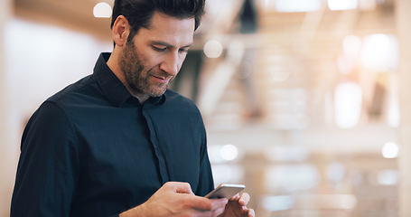 Image showing Business man, texting and phone with space in office mockup for networking, chat and email communication. Businessman, smartphone and focus for schedule, notes and social network app in workplace