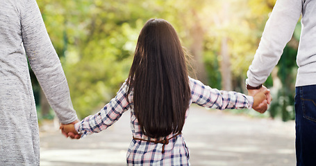 Image showing Back, garden and a girl holding hands with her grandparents while walking together in a park during summer. Nature, family or children and a female kid, grandmother and grandfather bonding outdoor