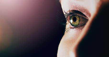 Image showing Woman, face and closeup of eye on mockup space for vision or sight against a dark background. Female person with eyelashes and green or hazel eyes looking in perception, eyesight or light on mock up