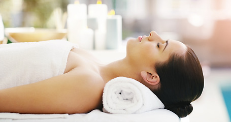 Image showing Woman, relax and sleeping on massage bed at spa for zen, physical therapy or healthy wellness at resort. Calm female person relaxing in peaceful sleep for luxury body treatment or self love at salon