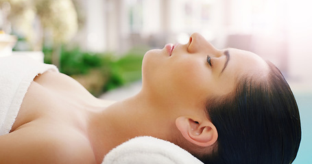 Image showing Woman, relax and face sleeping at spa for zen, physical therapy or healthy massage on bed at resort. Calm female person relaxing in peaceful sleep for luxury body treatment or self love at the salon