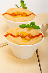 Image showing Hummus with mint on top