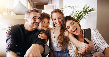 Image showing Selfie, mom and dad with kids, family home and smile with happiness, bonding and excited with mobile app. Man, woman and children with profile picture, photography and happy in new house for memory