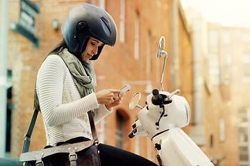 Image showing Motorcycle, woman and phone with navigation search in a city with helmet on a street. Motorbike, mobile connectivity and female person with map on urban road with journey and travel on bike